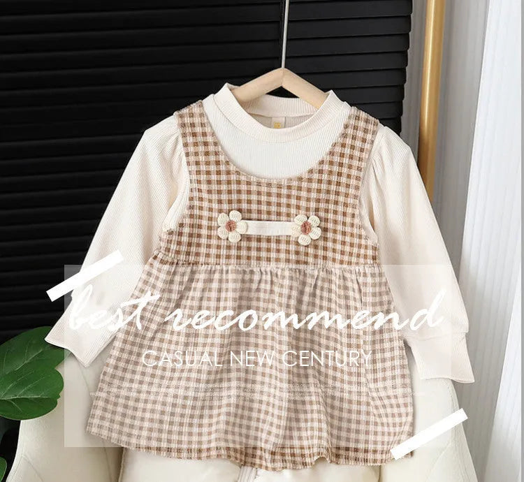 Baby girl wearing a dark coffee plaid Korean style long-sleeved dress suit with shirt.