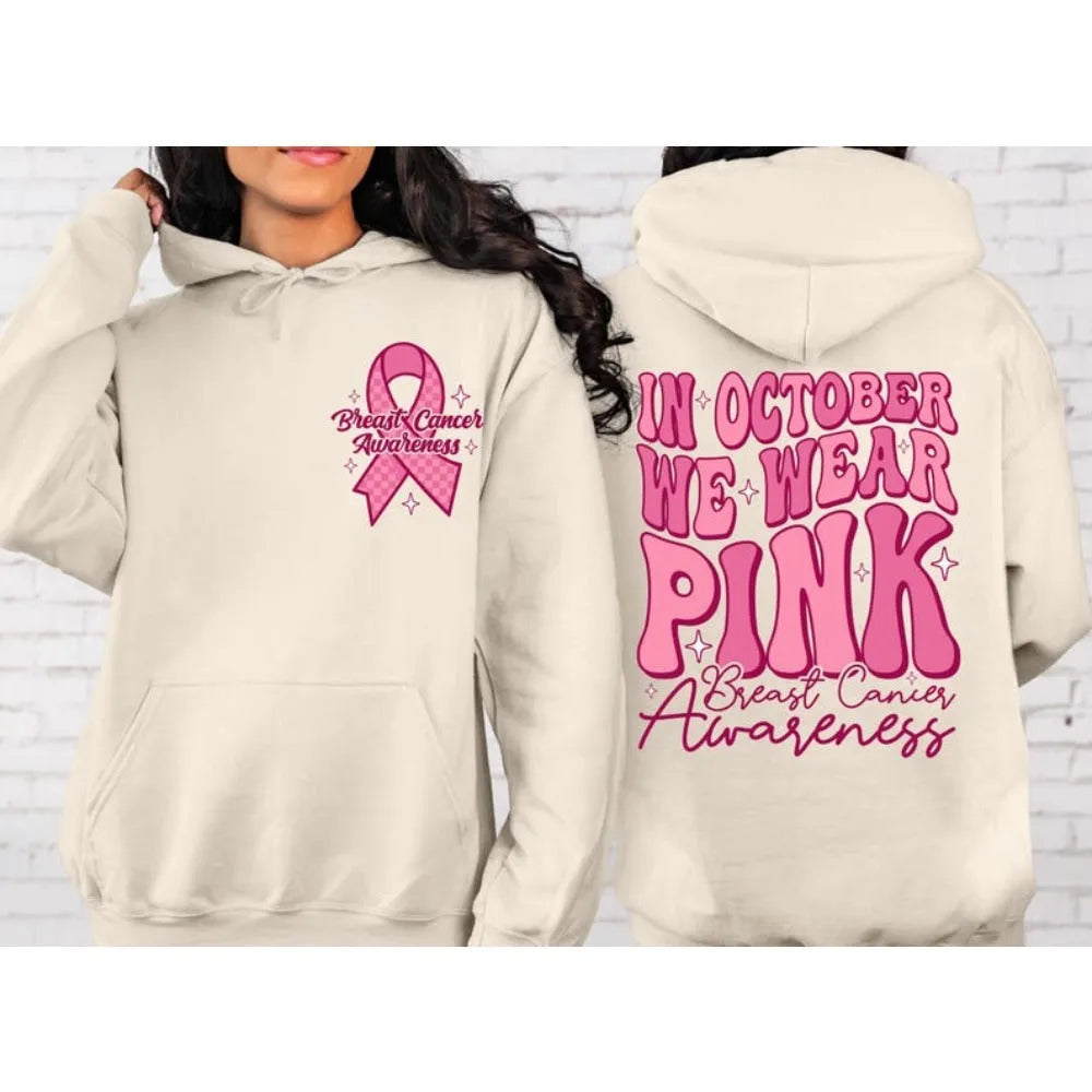 Pink breast cancer awareness pullover hoodie with retro hot stamp design and side pockets.