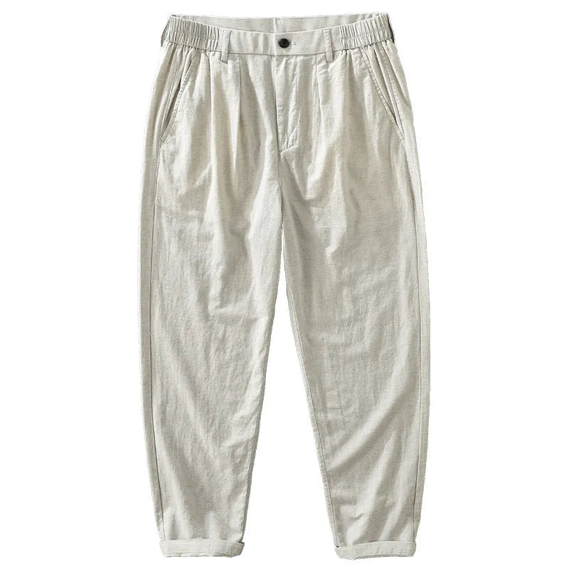 Man wearing loose straight-leg casual trousers in a cotton linen blend, showcasing the retro Japanese style.