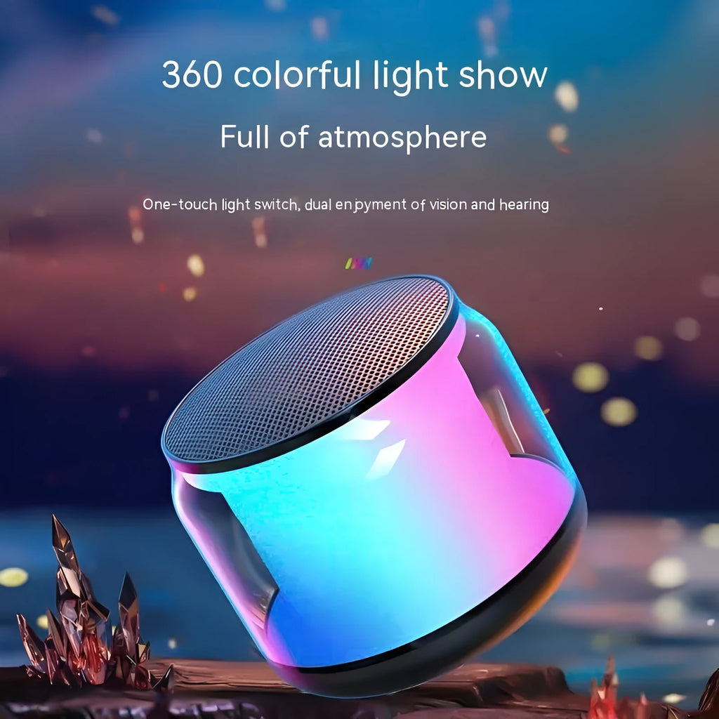 Black pistol-shaped Bluetooth speaker with colour glaze finish on desktop