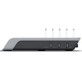 Black universal charging stand base for mobile phones and tablets on a desk.