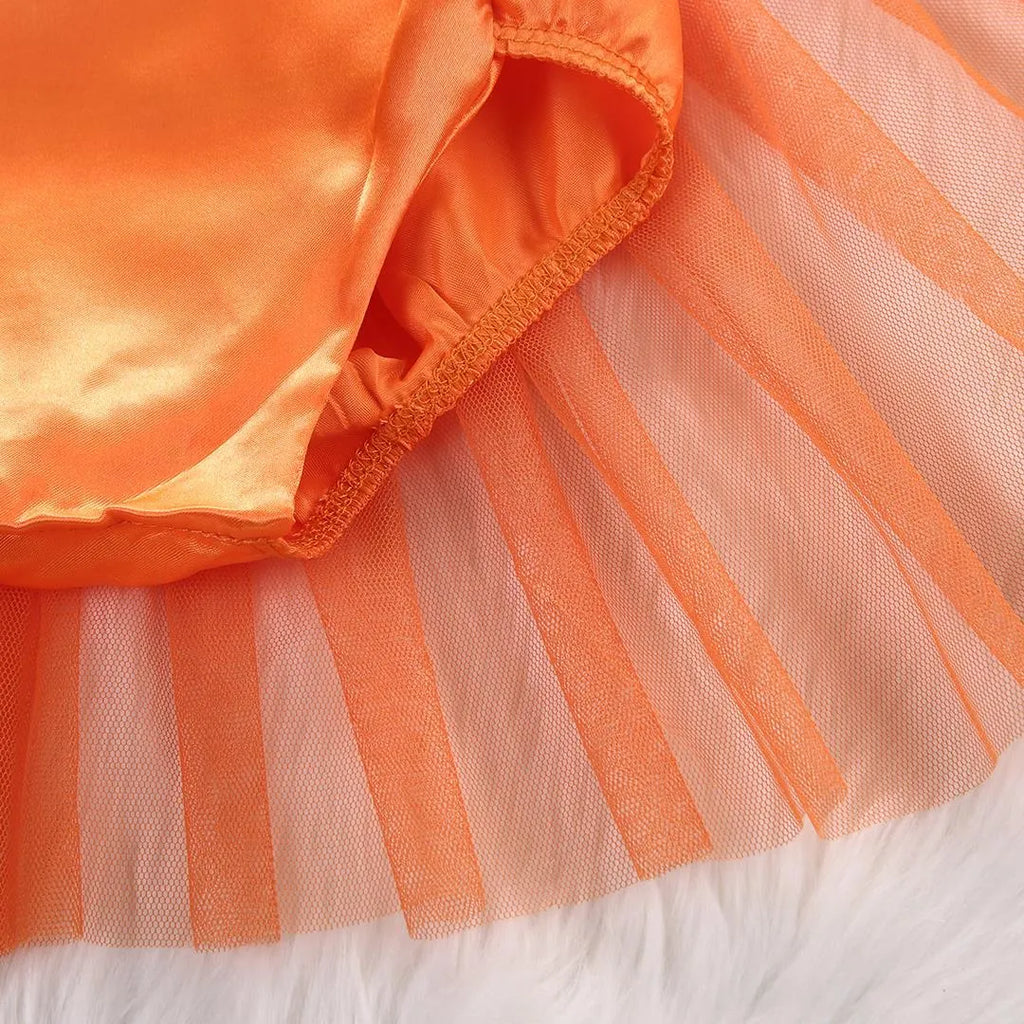 Children's orange Halloween gauze jumpsuit with cartoon dot pattern and voluminous pleated skirt on a white background