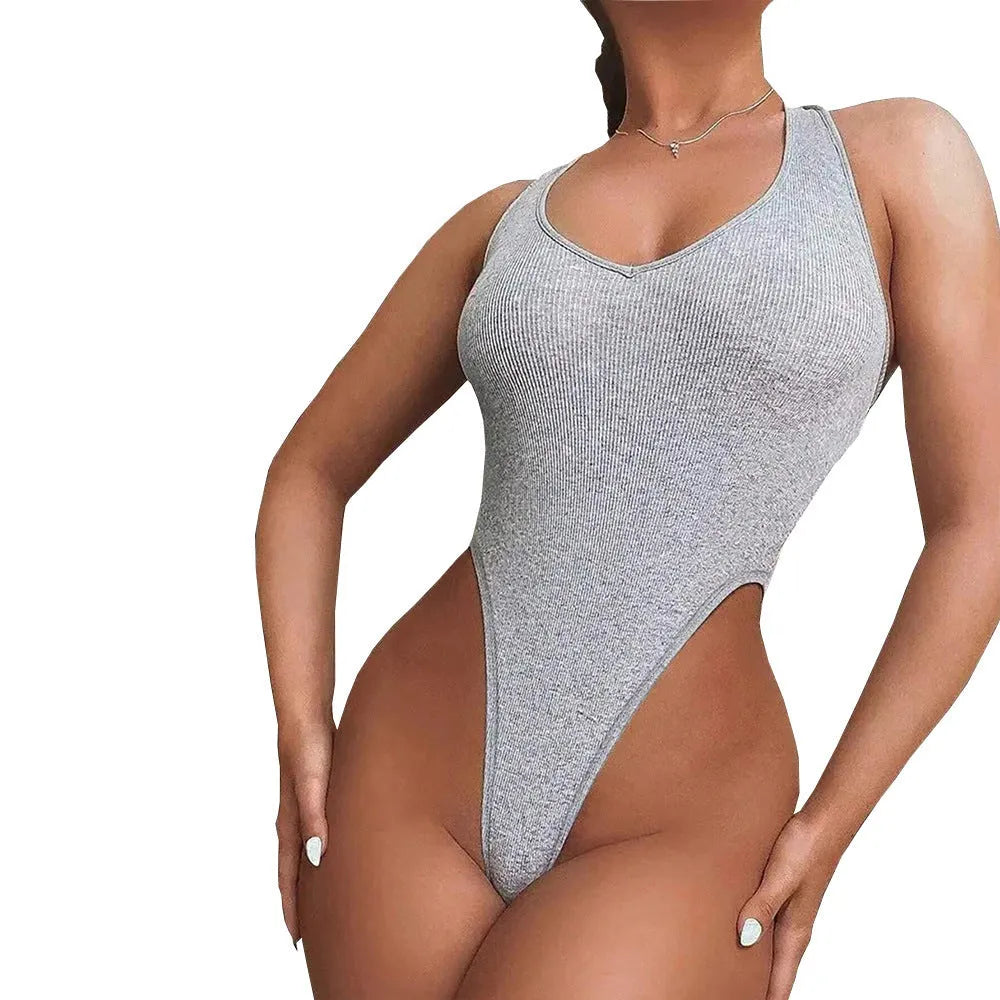 Grey women's halter jumpsuit with suspenders vest design and short shorts