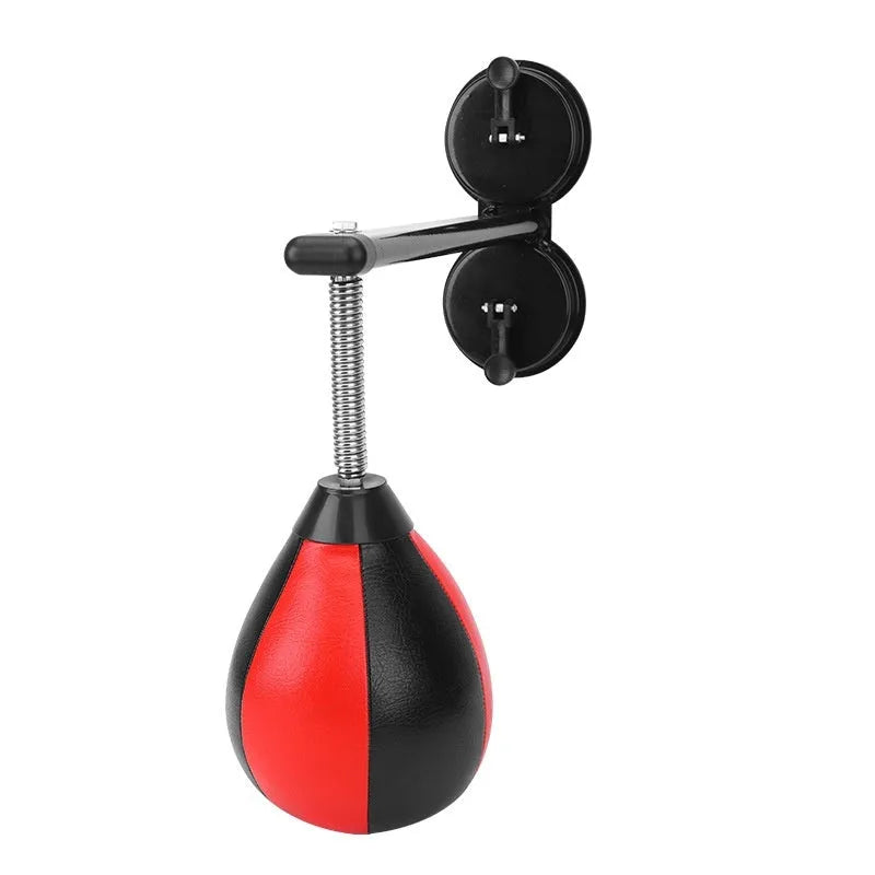 Pear-shaped inflatable punching ball with red and black design mounted with suction cups for boxing training
