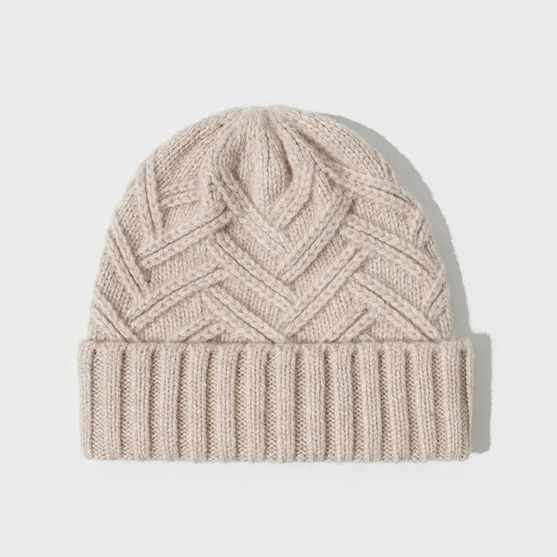 Women's wool knitted dome crown winter hat with a totem pattern, shown in one of six available colours.