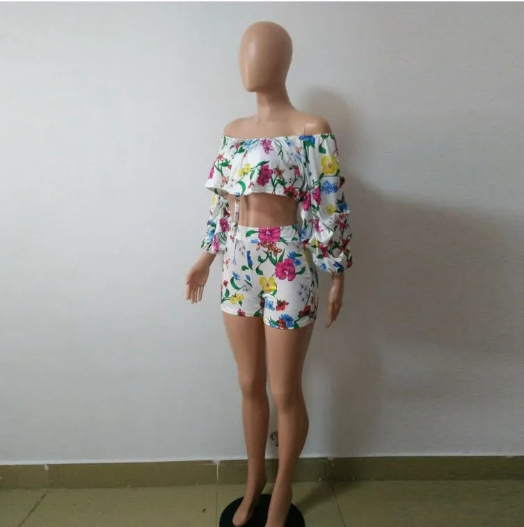 Multicolour digital print women's two-piece tracksuit with pile sleeves on the short top and matching shorts.