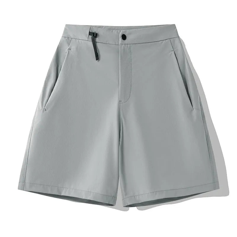 Men's khaki sports shorts with 3D cut and four-way stretch fabric for running and climbing.