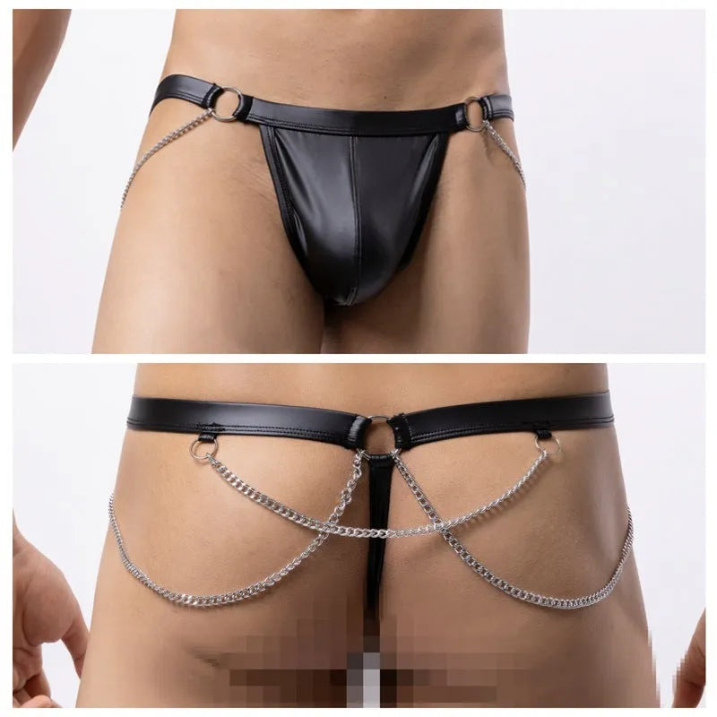 Black patent leather men's thong underwear with a decorative chain detail on the front.