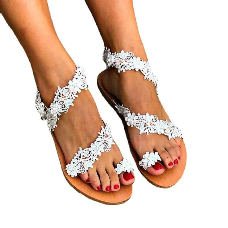 White women's sandals with rhinestone flower decoration and elastic back in sizes 35-43