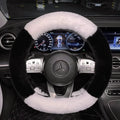 Milk tea white plush steering wheel cover with panda ears on a car steering wheel