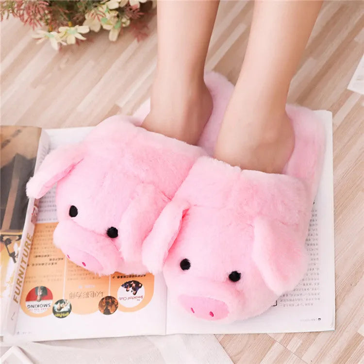 Pink adult pig slippers with short plush lining and a size chart showing international conversions.