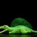 Green Spinosaurus simulation plush doll 45cm long from mouth to tail on plain background