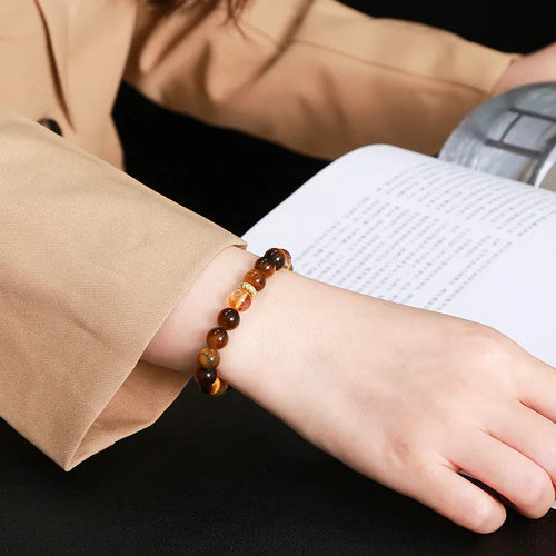 Natural yellow tiger's eye stone bracelet with 8mm beads mixed with yellow tower crystal in geometric design