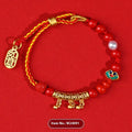 Red cinnabar bead bracelet with hand-woven construction and round geometric elements