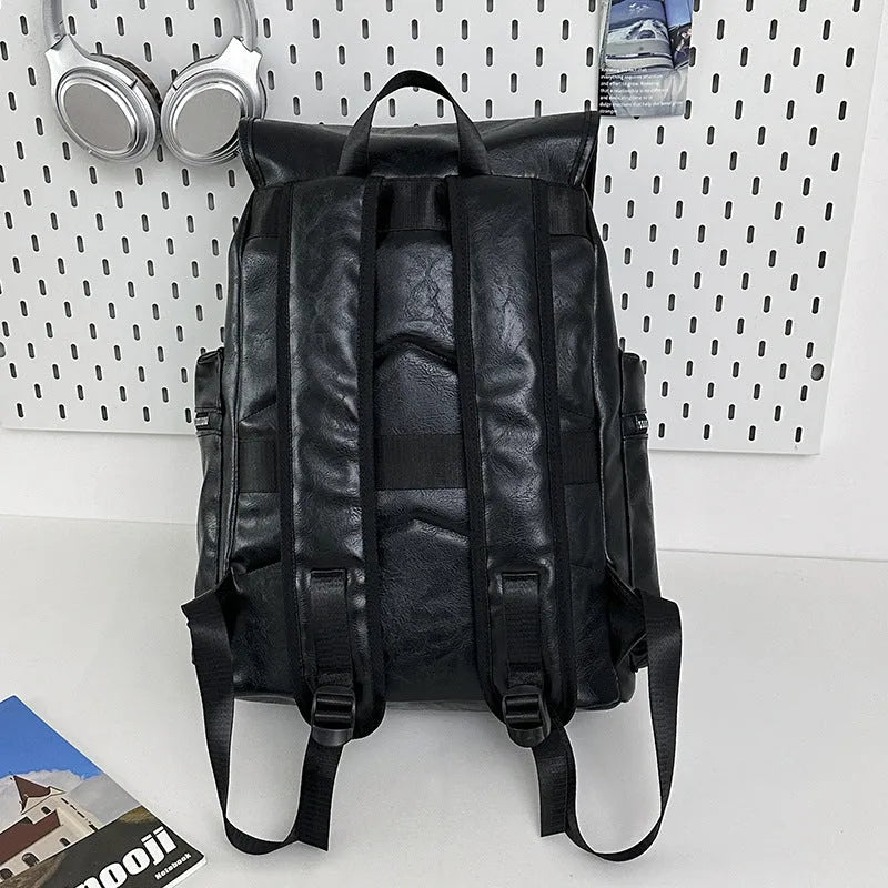 Solid colour PU couple travel backpack in black, curved shoulder strap, waterproof design for leisure travel