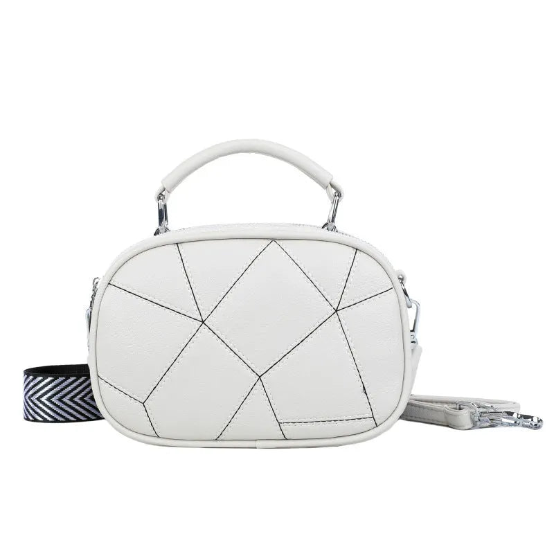 Three-layer retro patchwork small bag in round suitcase shape with stitching detail