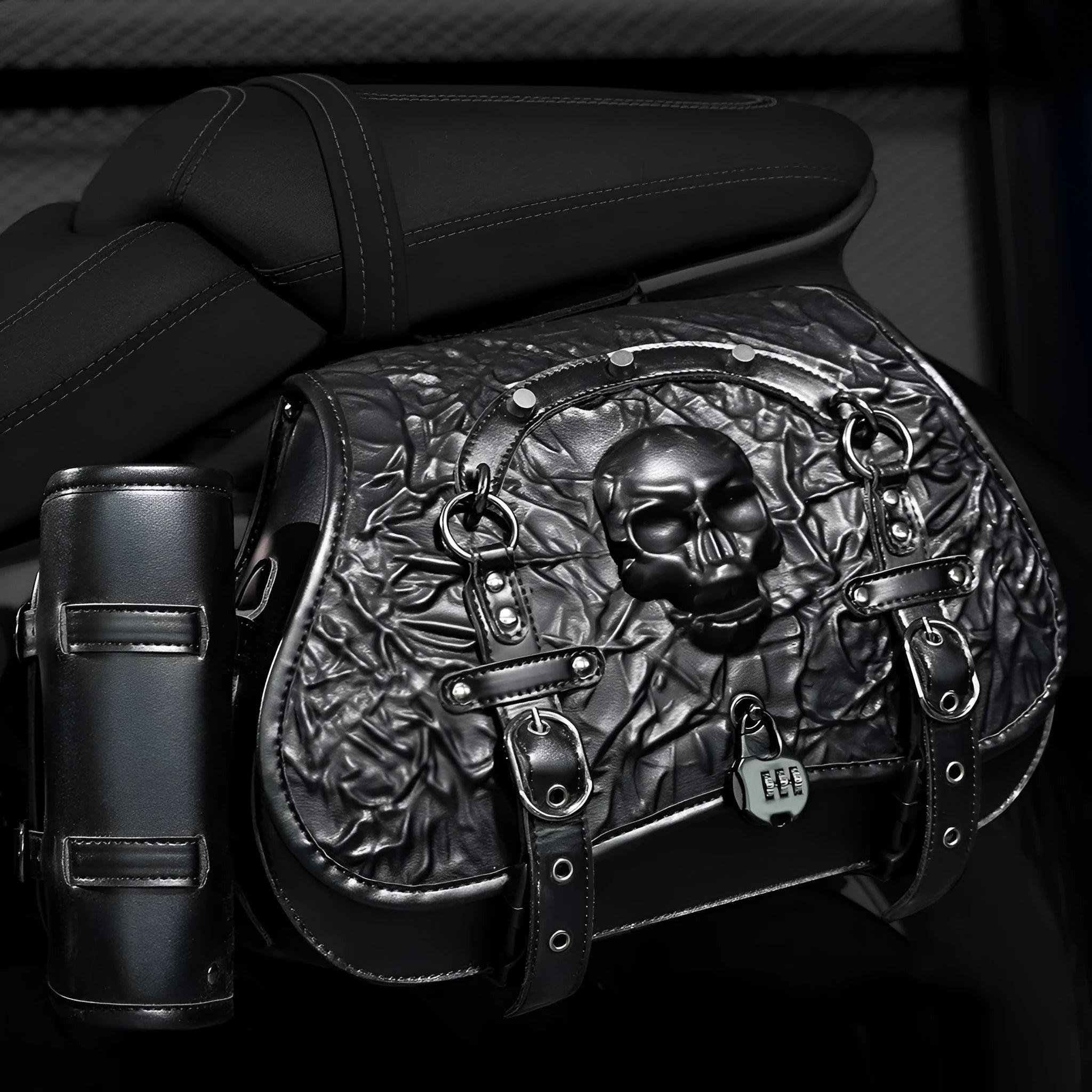 Pair of black PU leather motorcycle modified side luggage bags mounted on a bike.