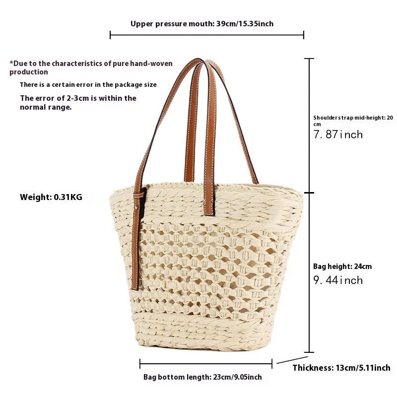 Beige paper string woven large capacity shoulder bag showing horizontal square shape and adjustable strap.