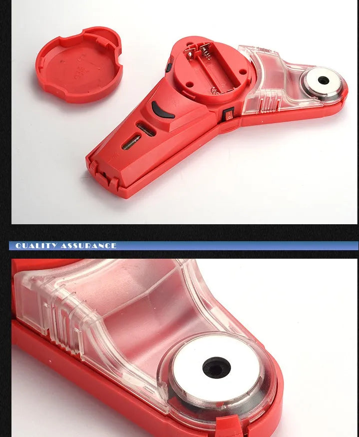 Red portable laser positioning level tool for woodworking and punching alignment on a workbench.