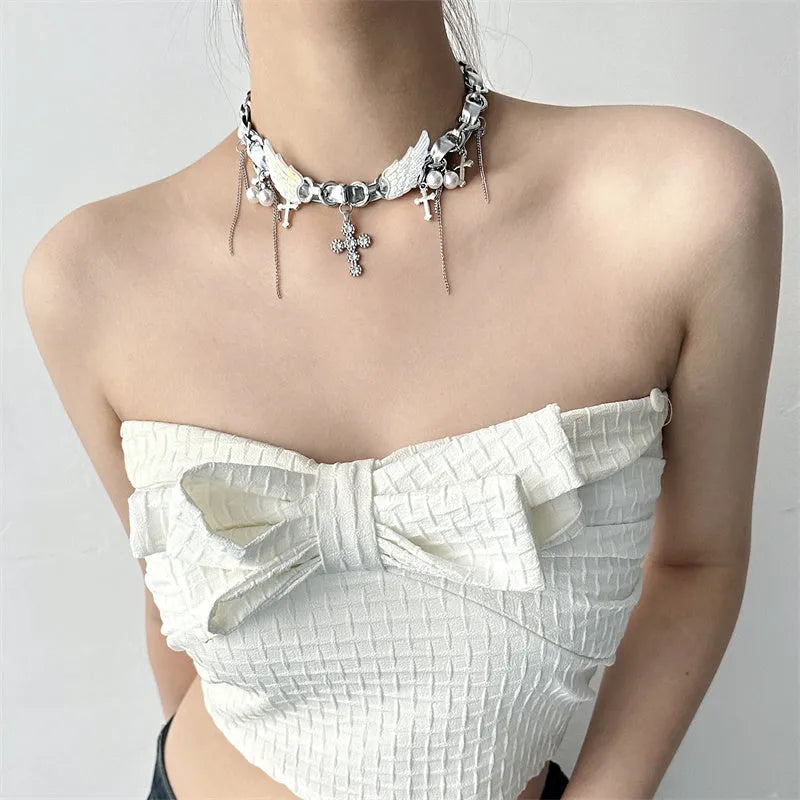 Silver zinc alloy star wings cross necklace on a clavicle chain with electroplated finish