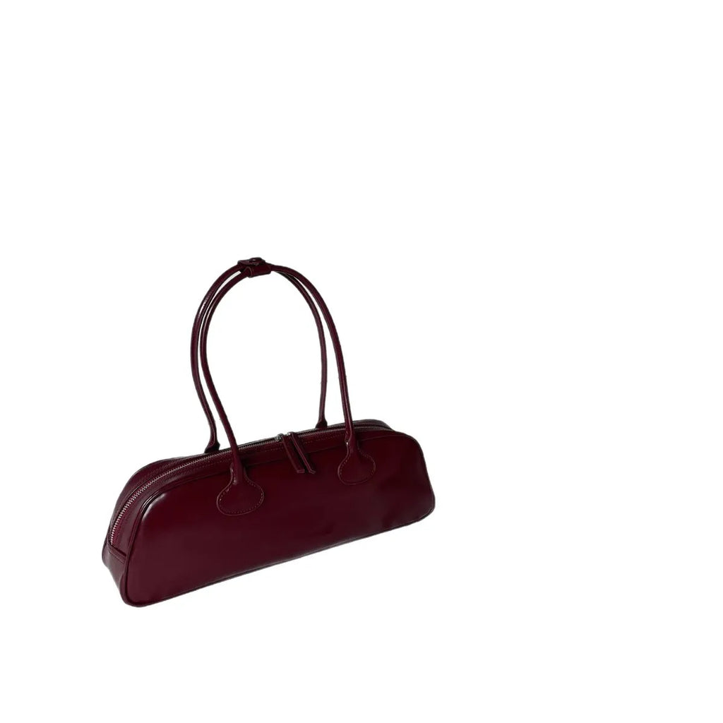 Retro genuine leather baguette bag in wine red with oval shape and sandwich pocket