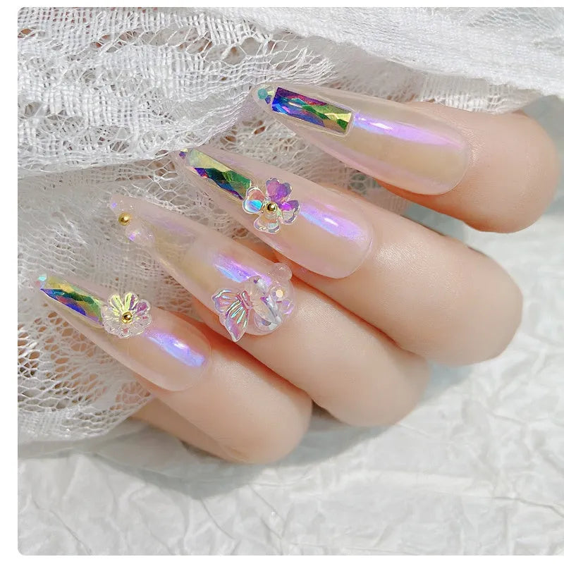 Jar of nail sequins with flower and butterfly shapes in 6 colours, 15g net content