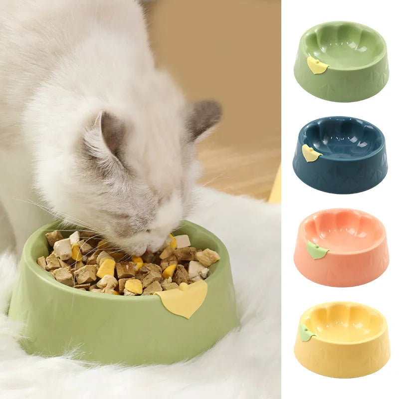Green plastic flower-shaped double pet bowl for dog and cat food and water.