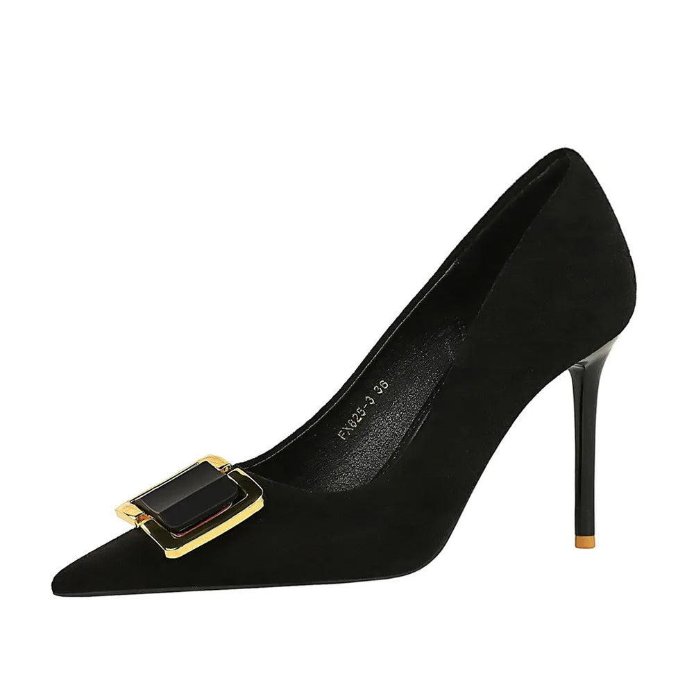 Black suede women's stiletto high heels with a pointed toe and a 9cm heel on a rubber sole.