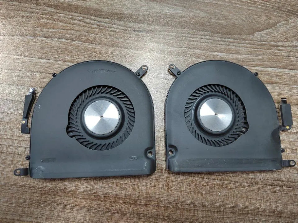 Apple MacBook Pro A1398 internal cooling fan replacement part on a paper box.