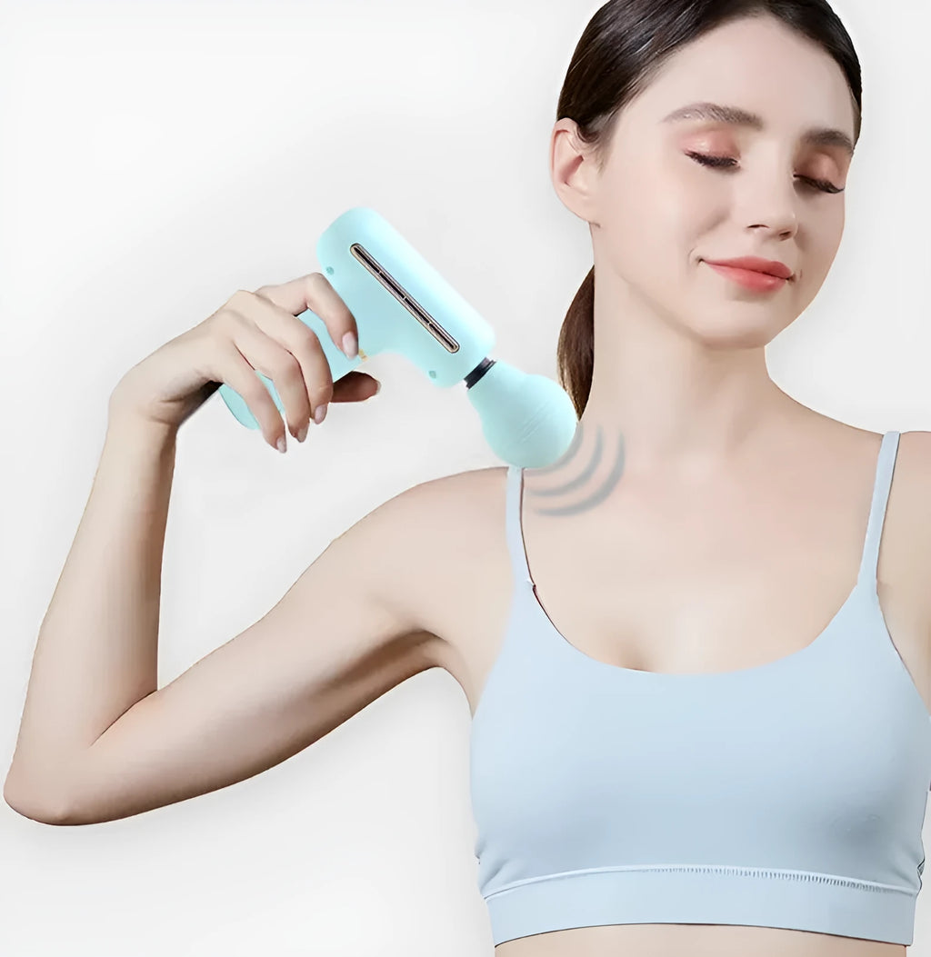 Mini massage gun in green or pink with brushless motor, USB power, 20 x 16.5 x 5.6 cm size, and 327 g weight