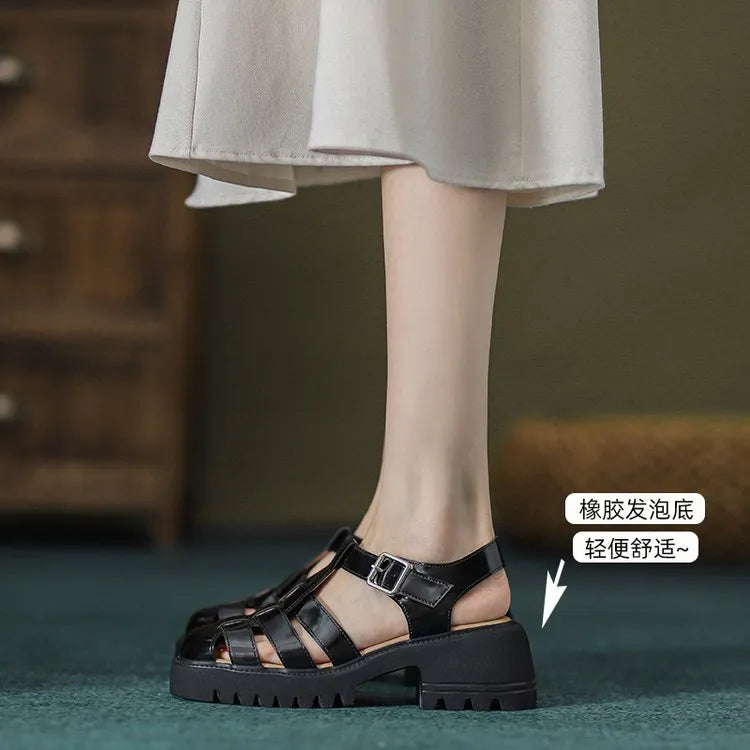 Women's black platform sandals with buckle closure and chunky hollow sole