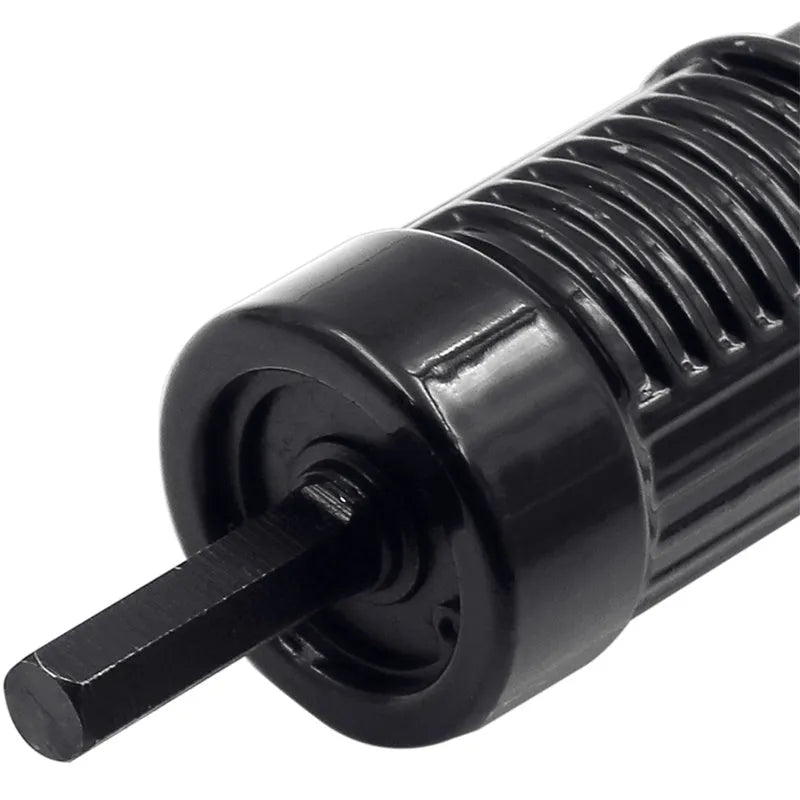 Black metal electric drill rivet gun attachment with wrench and four rivet heads.