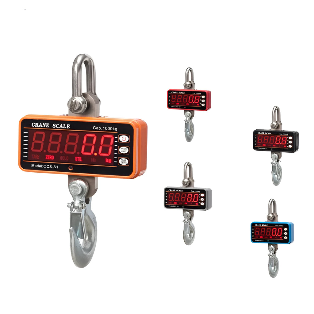 Orange electronic crane scale with digital display for 500 kg loads in warehouse.