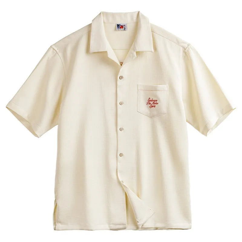 Light apricot men's shirt with bamboo floral pattern and Cuban collar.