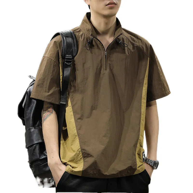Brown men's short-sleeve half-zip shirt with a stand collar, showing the loose fit and ice silk fabric texture.