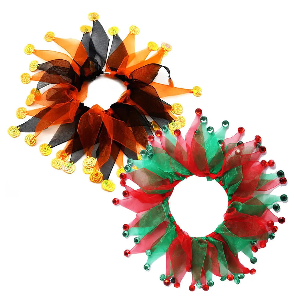 Colourful tie-dye dog collar on a white background showing blue, green, Halloween and Christmas patterns.
