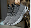 Men's solid colour casual shoes with a mesh upper in Army Green, shown from the side.