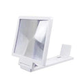Black and white adjustable magnifying mobile phone stand on a table.