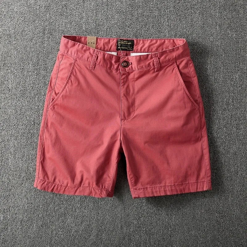Men's loose cotton shorts in straight-leg style showing zipper fly and multiple colour options
