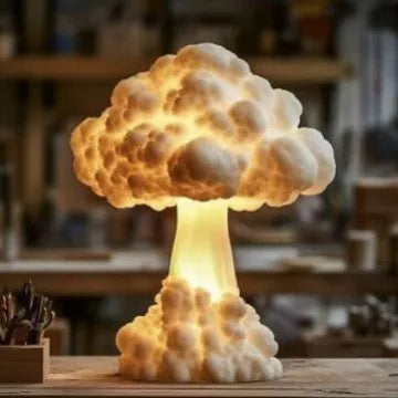 Modern atomic mushroom cloud shaped USB table lamp on a dark surface.