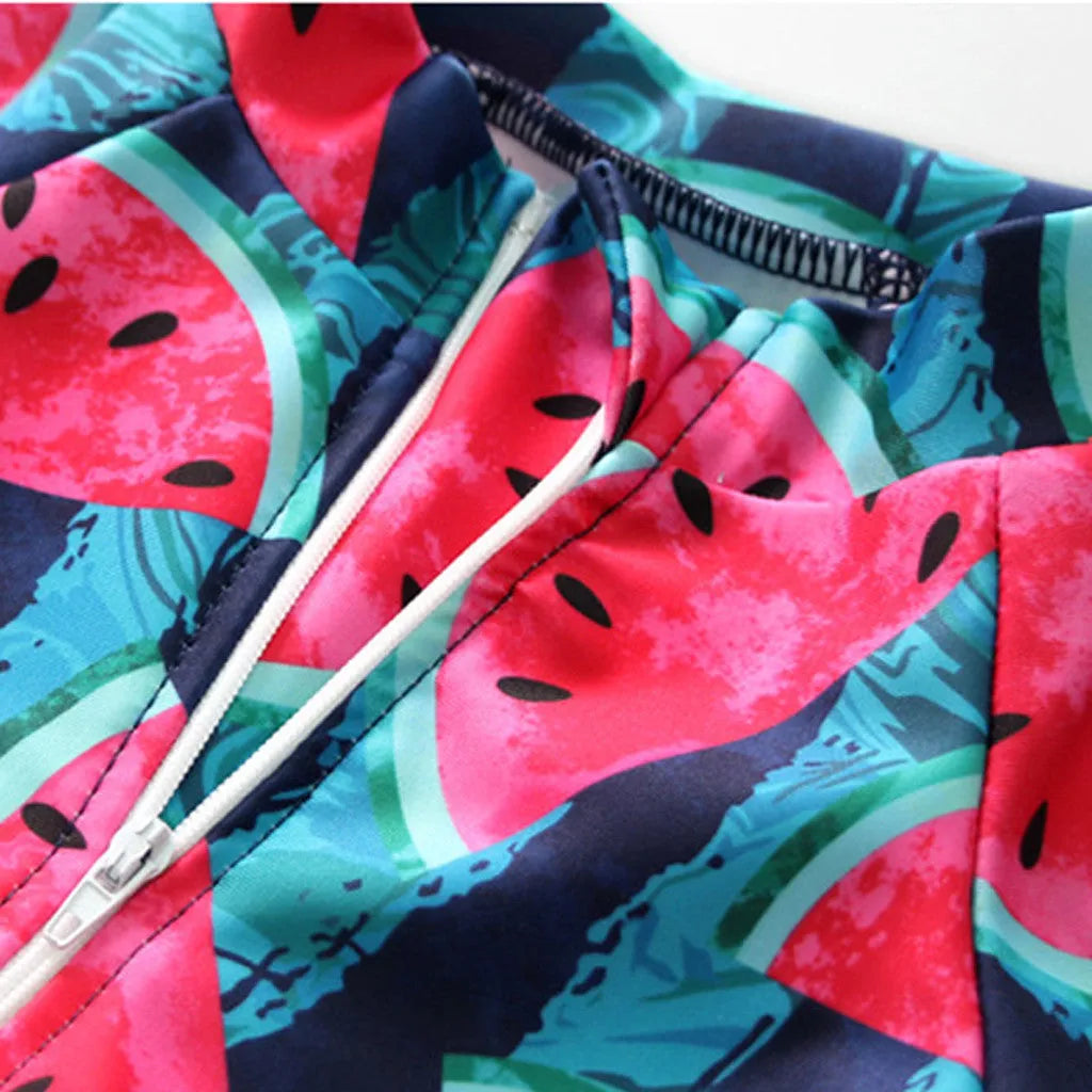Cool watermelon children's long sleeve swimsuit set with fruit print on a white background