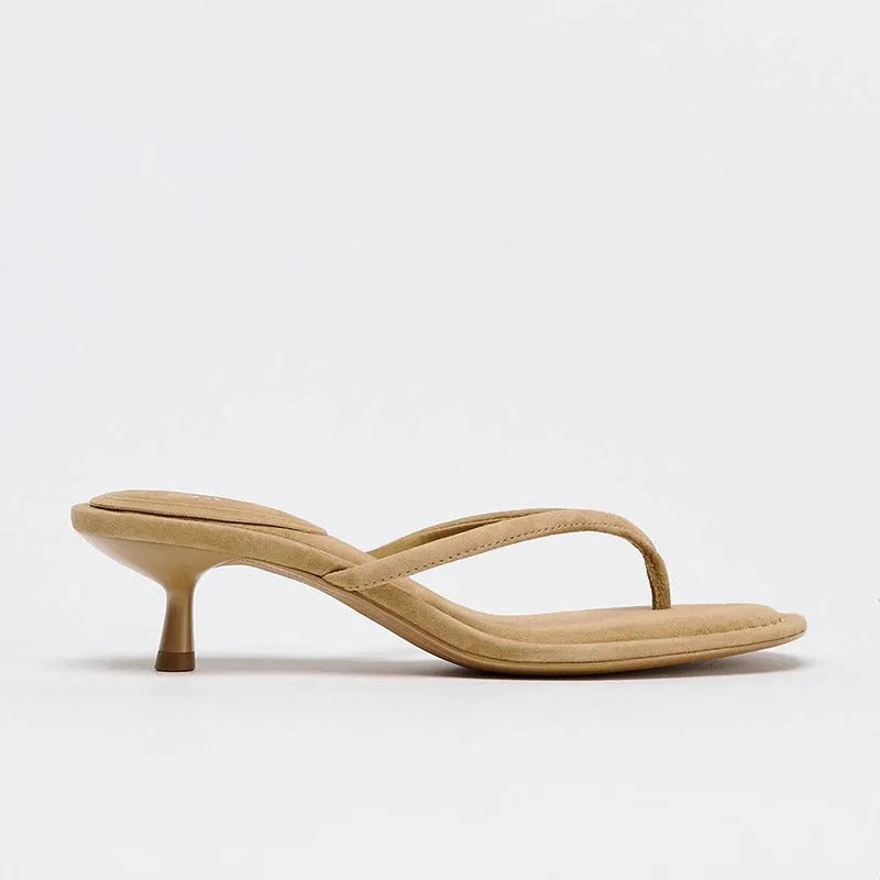 Women's khaki mid-heel flip-flop sandals with round toe and rubber sole on a plain background.