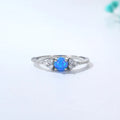 Geometric silver ring with big diamond design, electroplated finish, white or blue opal colour, sizes 5 to 9