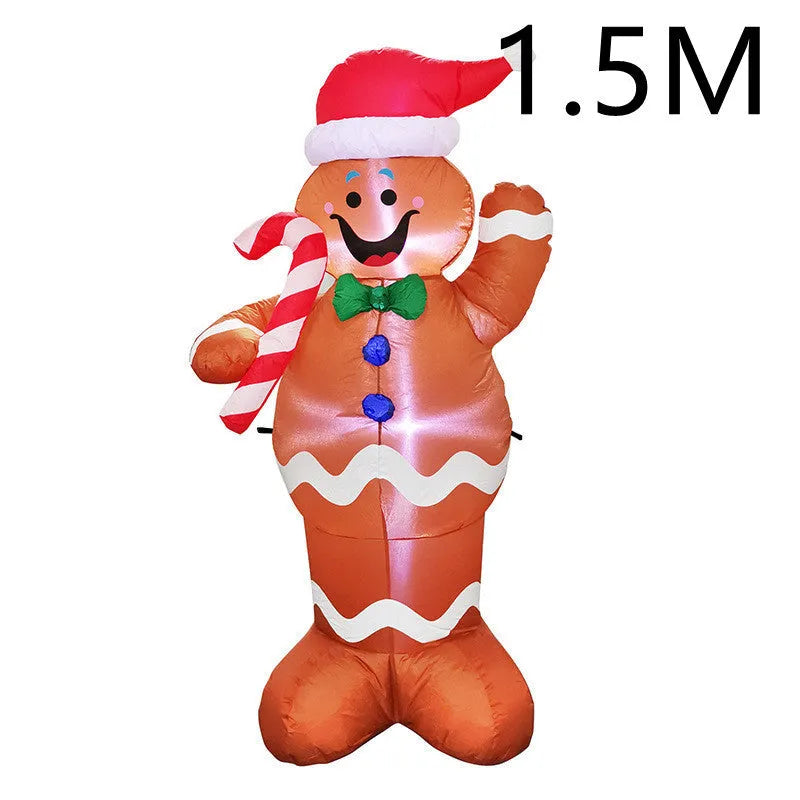 Glowing LED inflatable Christmas decorations including Santa, snowman, and a Christmas tree for outdoor garden use.