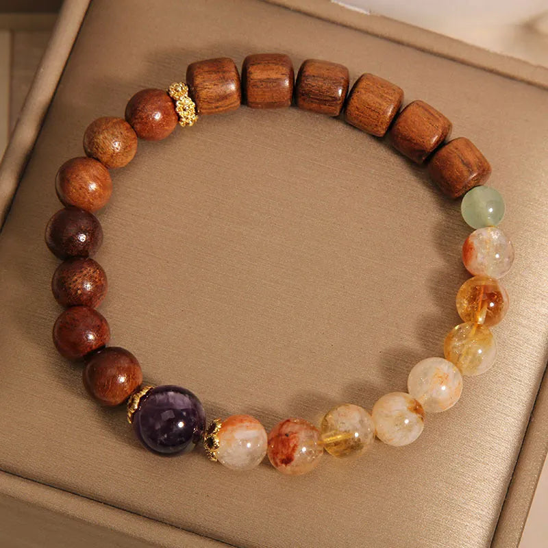Women's crystal bracelet with yellow tower crystal and ebony amethyst beads featuring pearl accents
