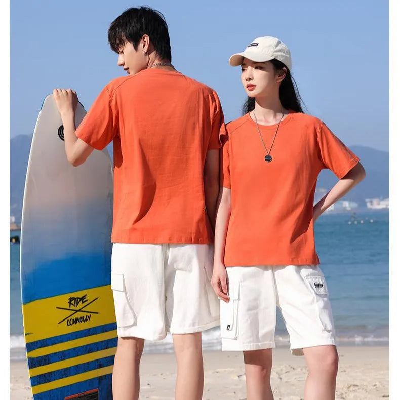 A man's pure cotton solid colour short sleeve T-shirt laid flat, showing its straight cut.