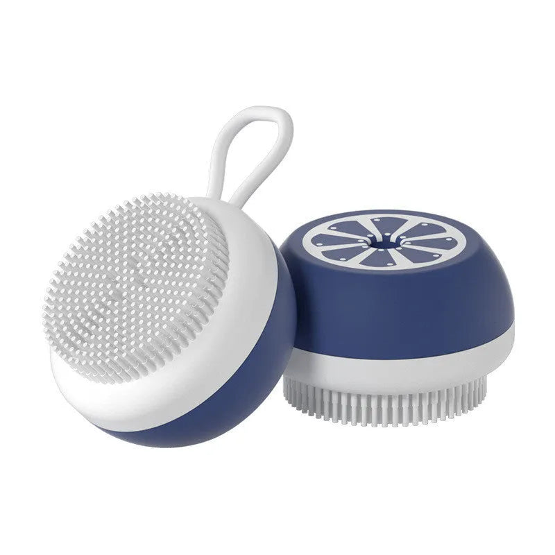 Yellow silicone pet bath brush and grooming comb tool held in a hand.