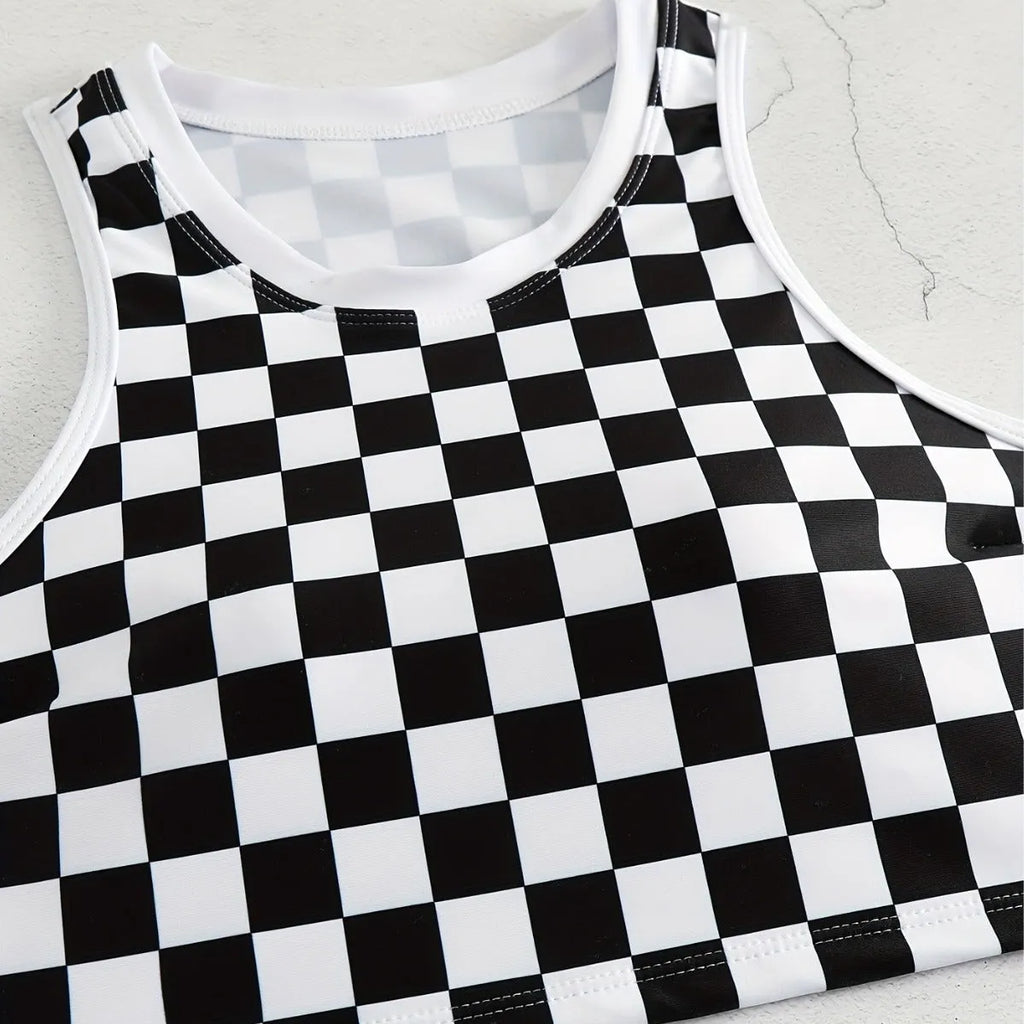 Women's backless racing swimsuit with shoulder suspender strap in black and white chessboard pattern