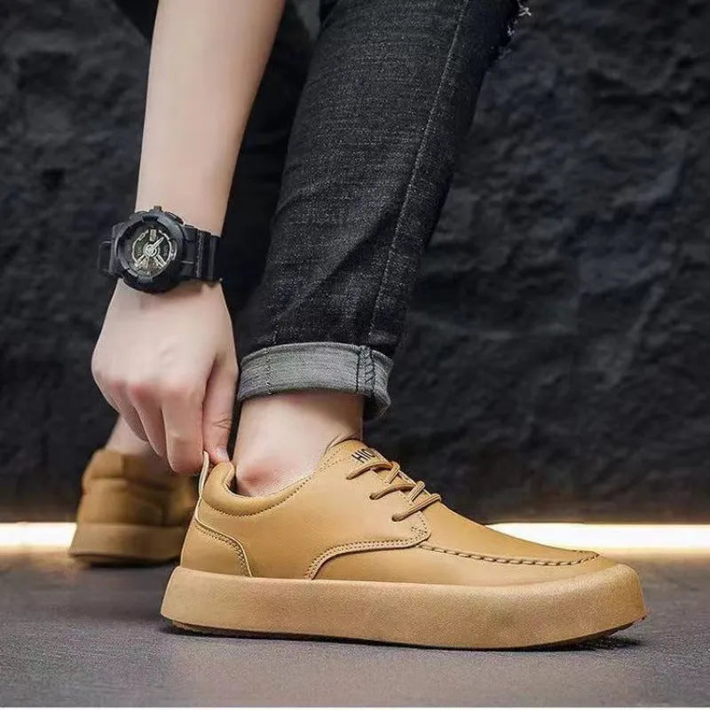 Men's brown casual lace-up platform shoes with a round toe and flat heel on a white background.