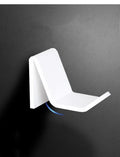 Universal game controller mounting bracket in black colour with nail and adhesive installation options
